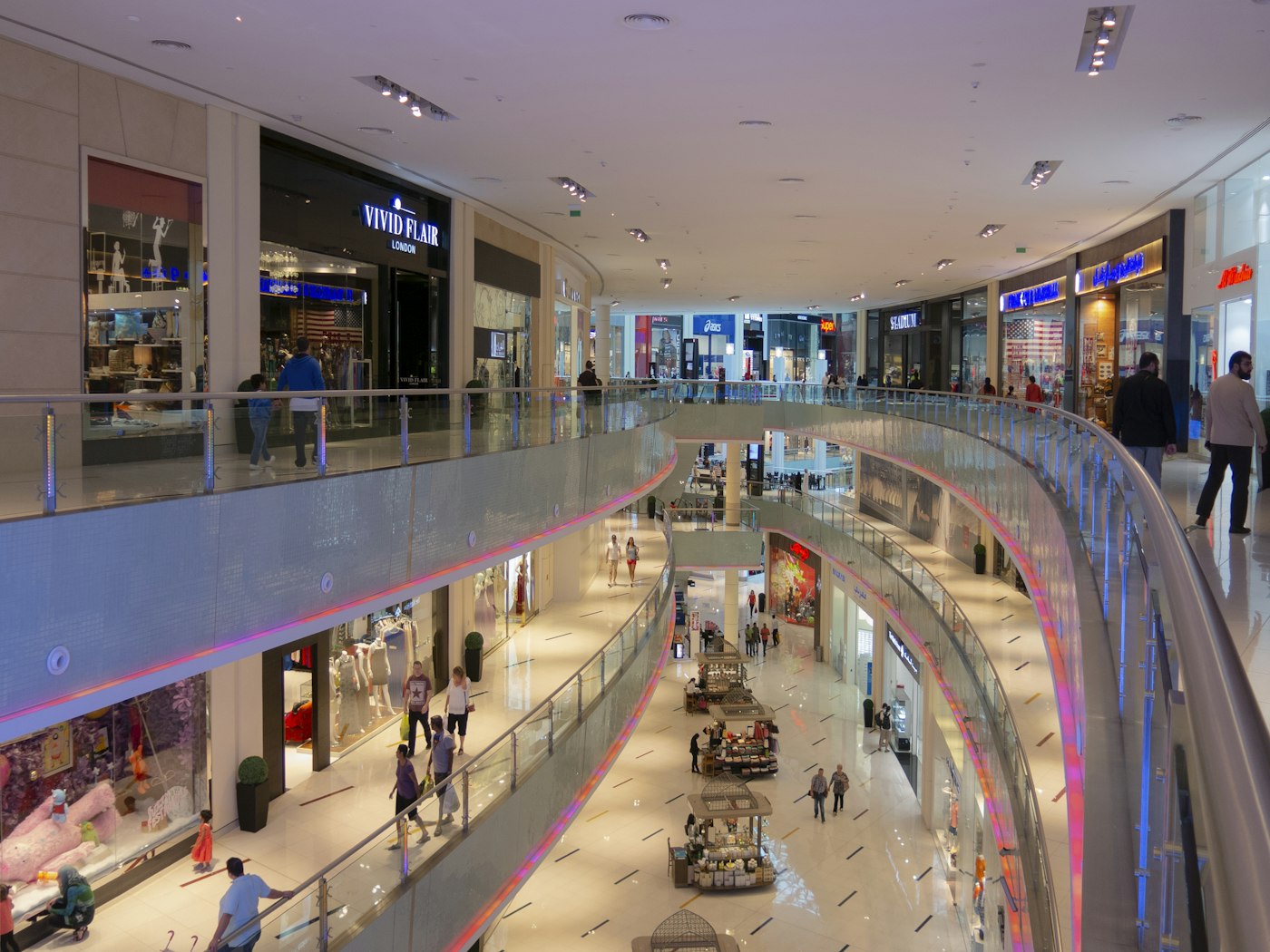 Shoppers and storefronts inside The Dubai Mall